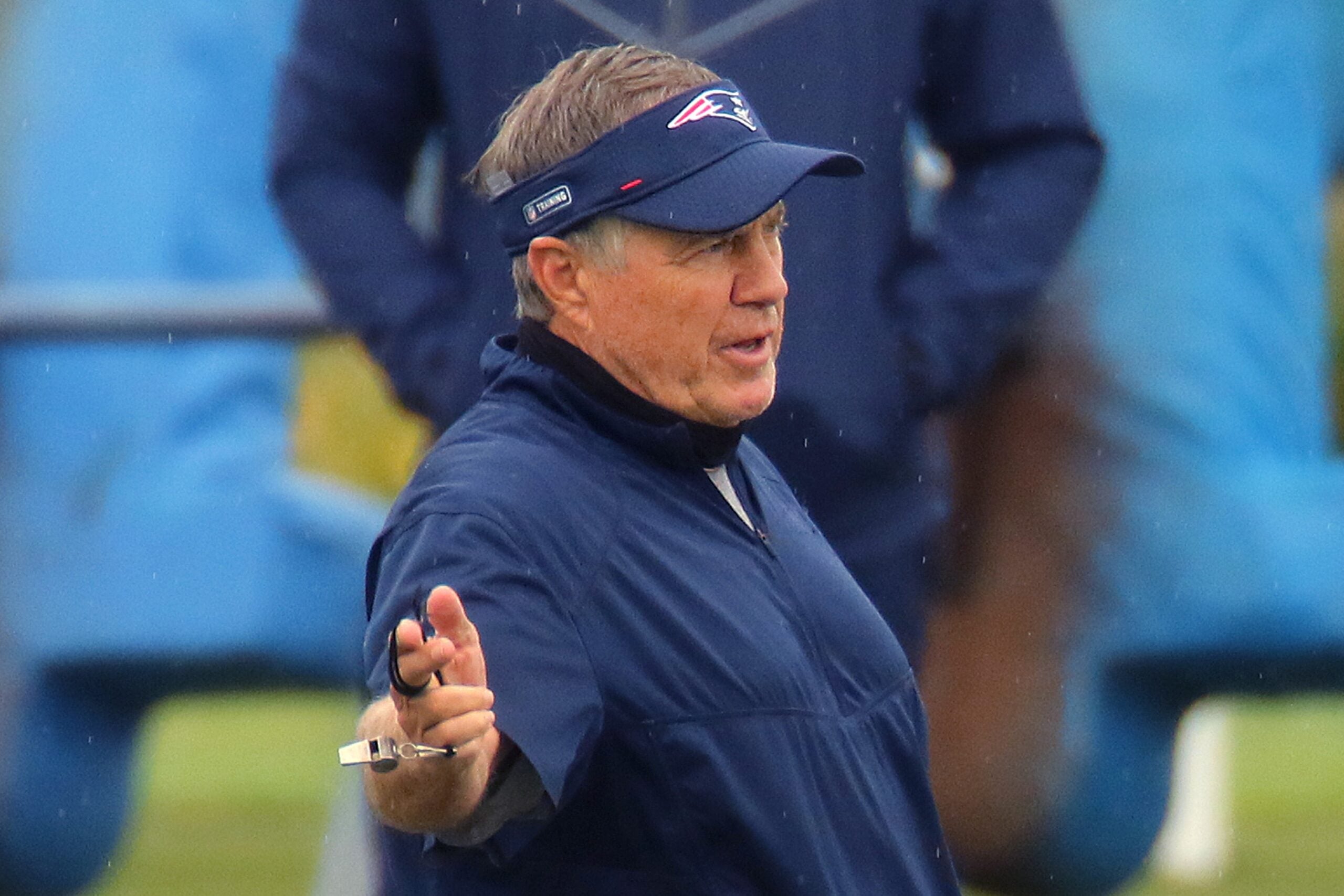Bill Belichick stays on the move while coaching Patriots training