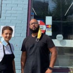 Ana Maria Fidalgo and son Joshua Fidalgo outside Nôs Casa Cafe in Roxbury