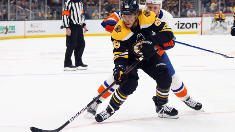 See the moment David Pastrnak hands his stick to a heckling young Islanders  fan