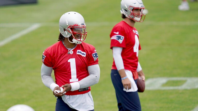 Cam Newton suffers bone bruise in throwing hand during Patriots OTAs