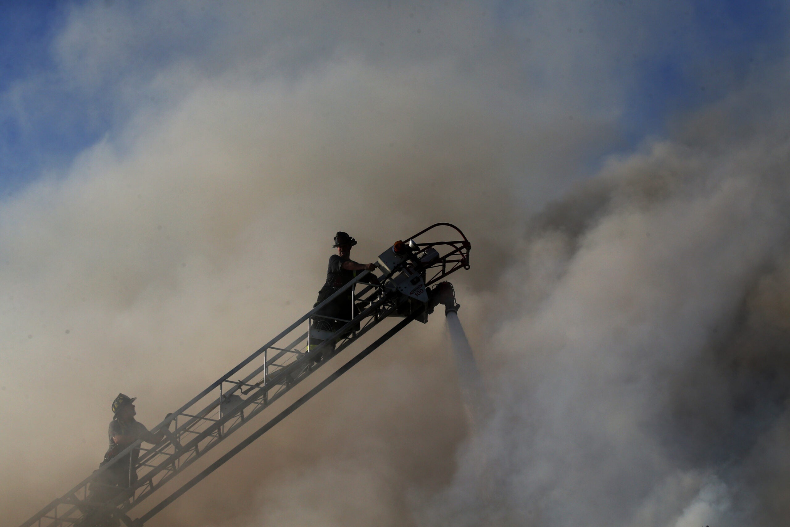 Firefighters deal with extreme heat while battling 7-alarm blaze in Revere