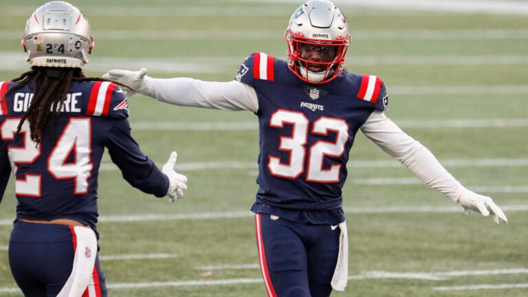 New England Patriots safety Devin McCourty (32) takes the field to