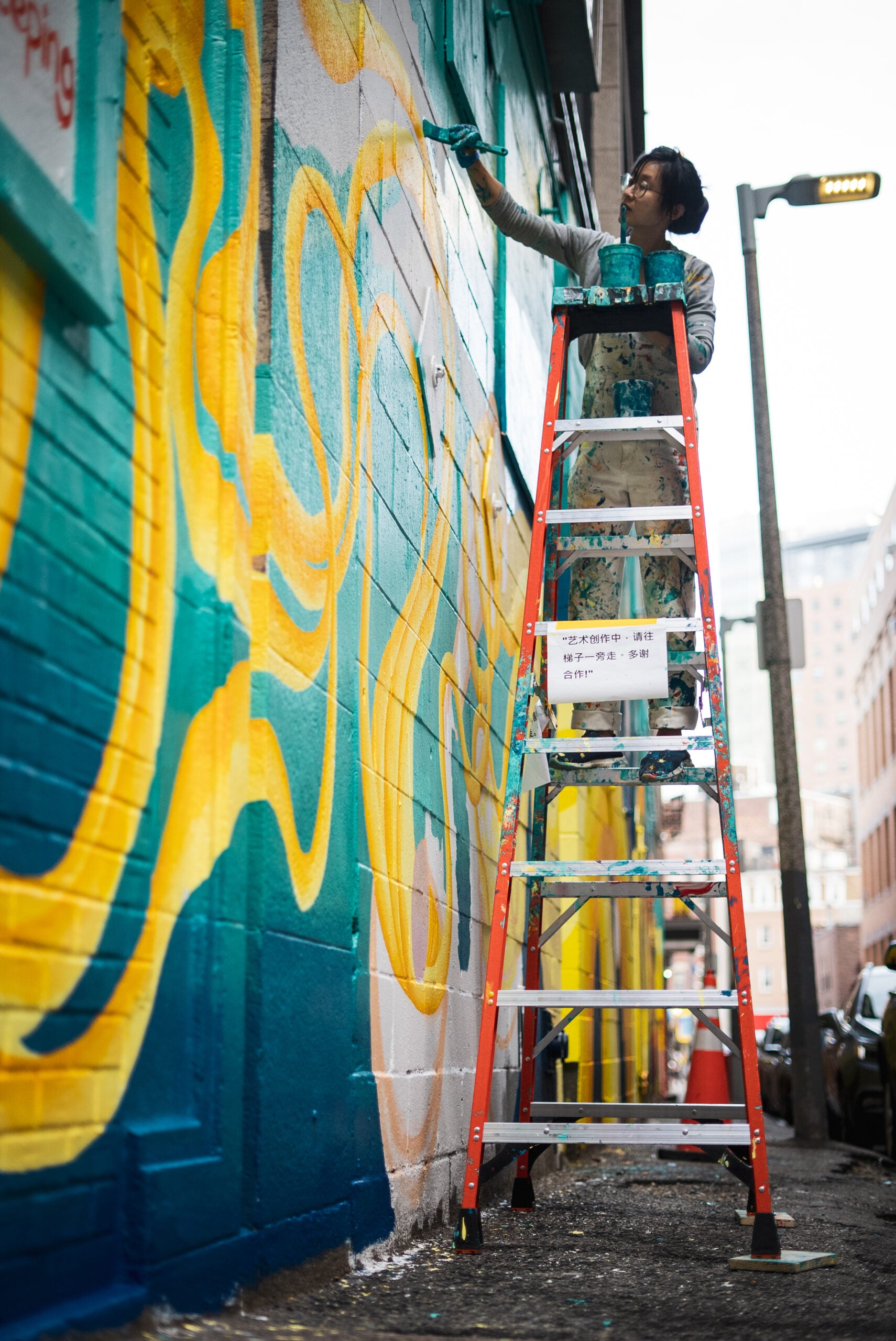 Historic street in NYC's Chinatown being painted into giant mural