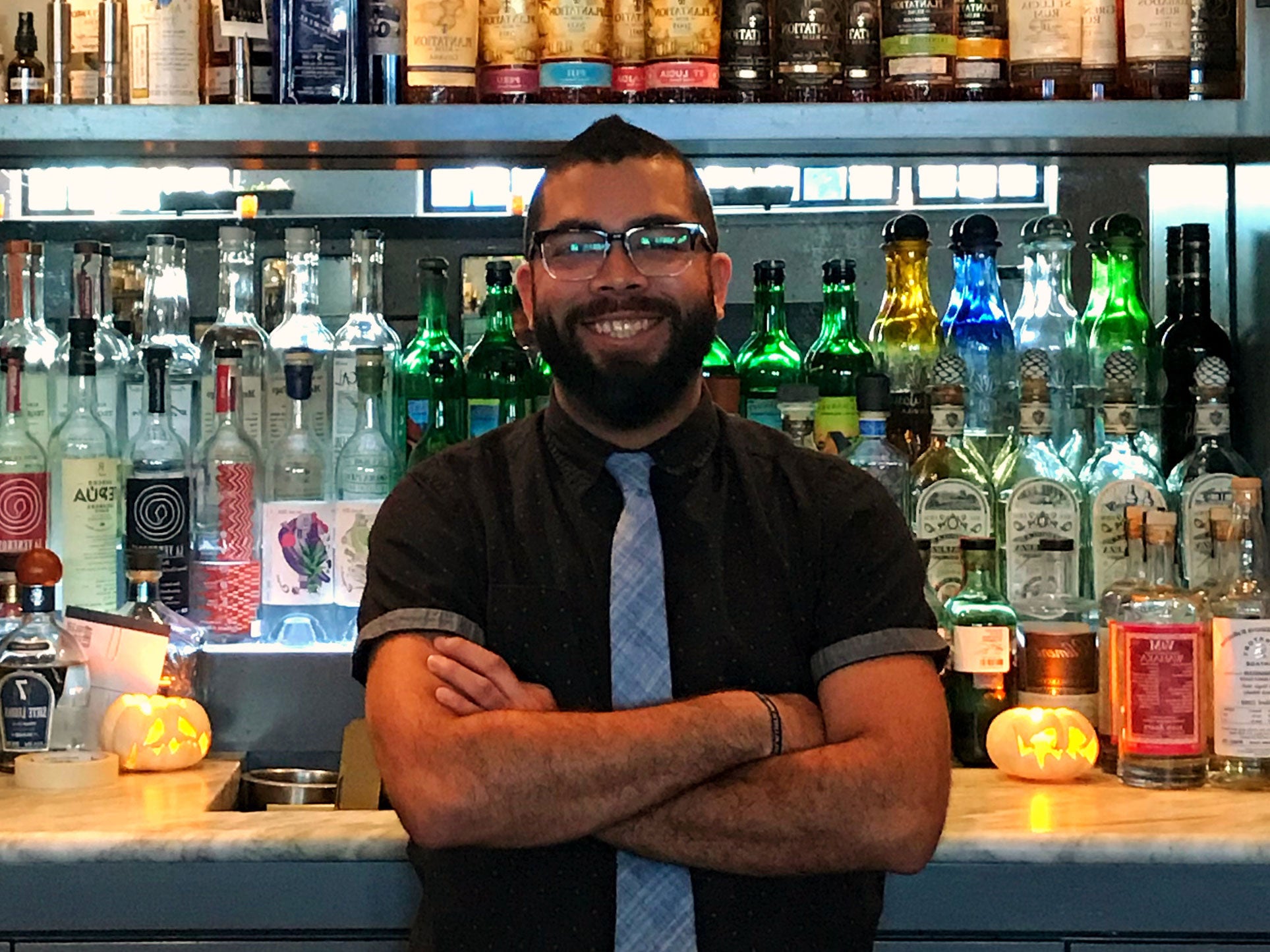 Meet the cocktail slinger behind a Southie bar with a killer rooftop view