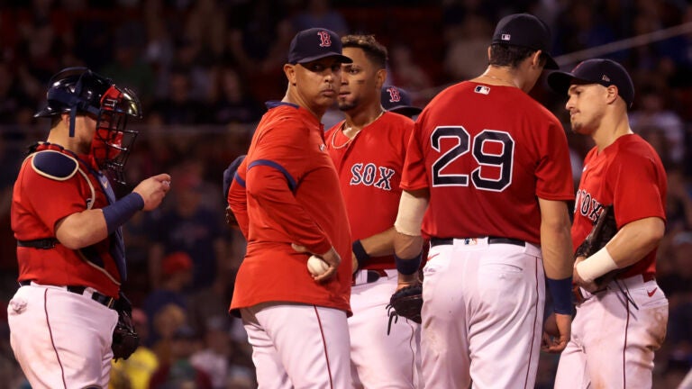 Boston Red Sox manager Alex Cora hugs his daughter Camilla after Game 5 of  baseball's World Series against the Los Angeles Dodgers on Sunday, Oct. 28,  2018, in Los Angeles. The Red