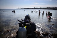 Rockport group who filed suit against divers last summer now say they own the beach