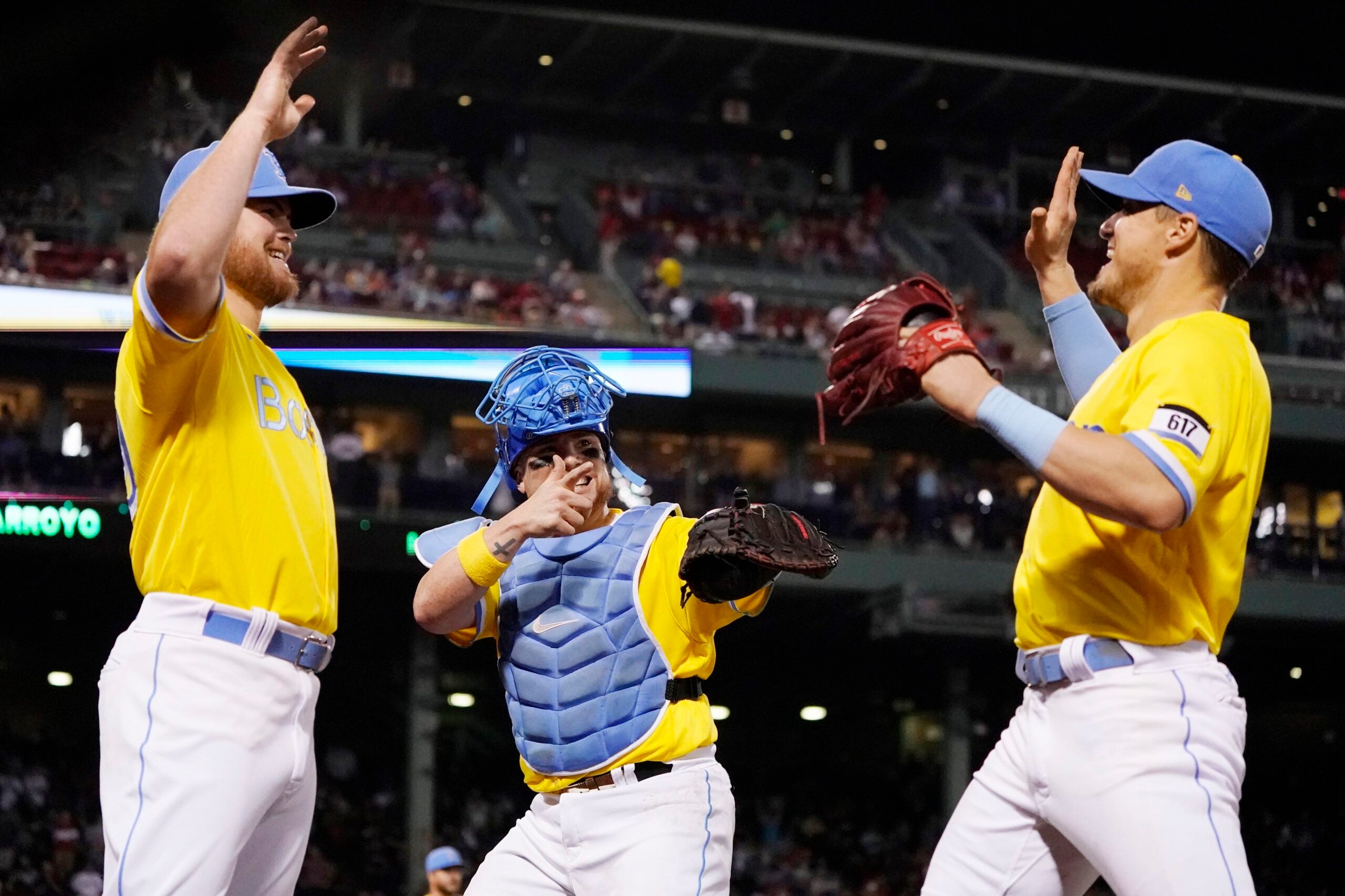 Why are the Boston Red Sox wearing yellow and blue uniforms today?