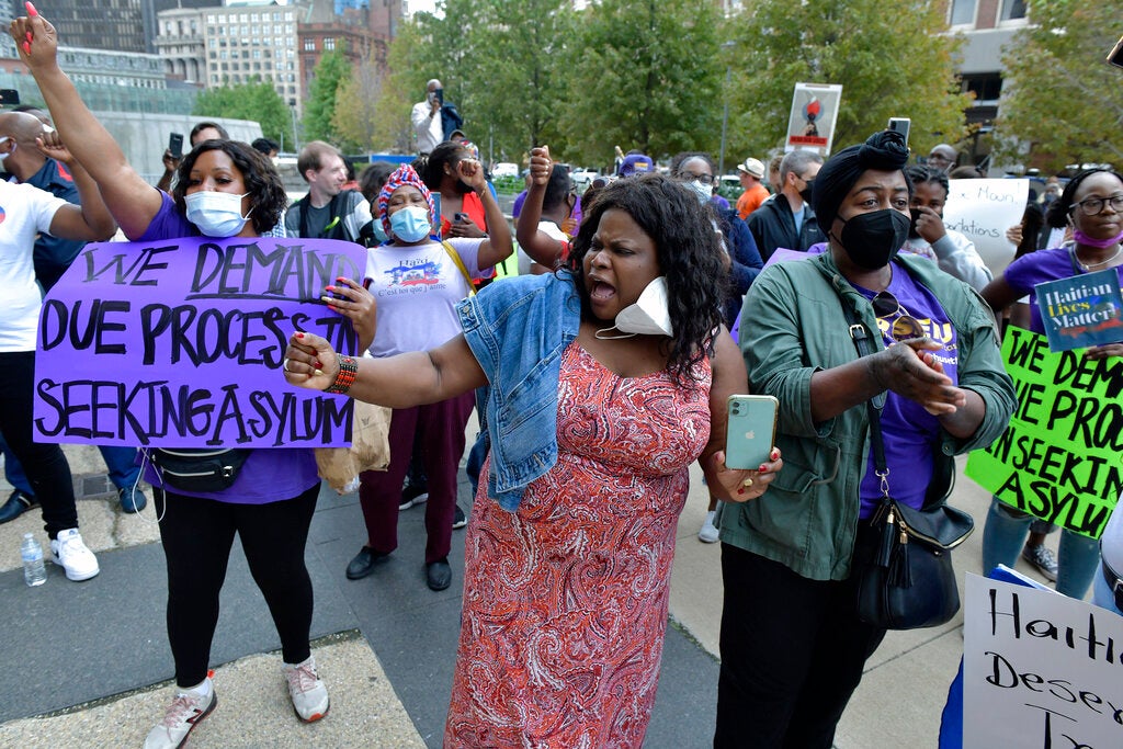 Haitians march through downtown to demand intervention in their home country  - The Boston Globe