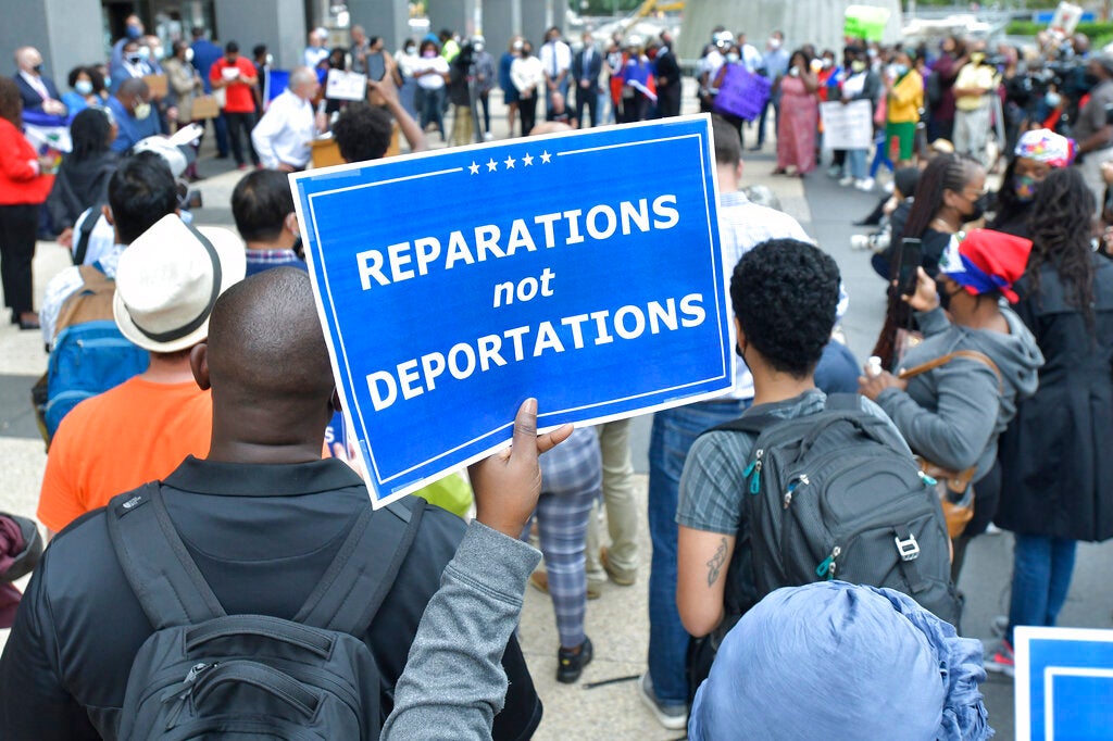 Haitians march through downtown to demand intervention in their home country  - The Boston Globe