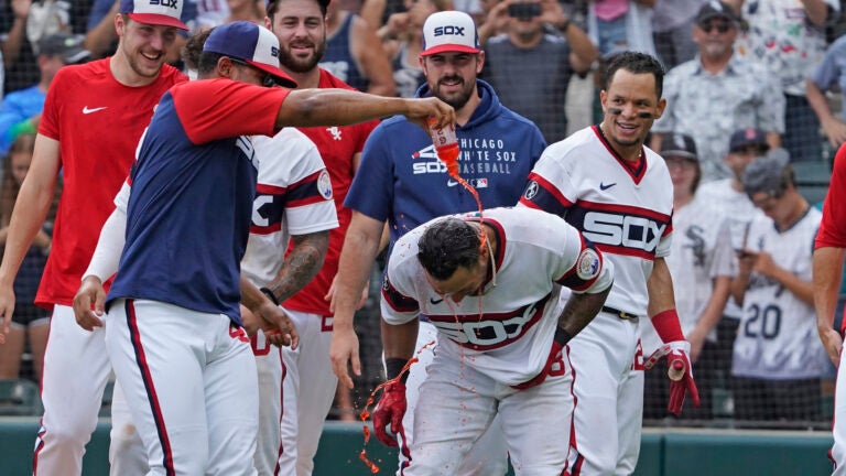 Chicago White Sox' Leury Garcia (28) hits a walk-off home run during the  ninth inning against the Boston Red Sox in a baseball game, Sunday, Sept.  12, 2021, in Chicago. (AP Photo/David