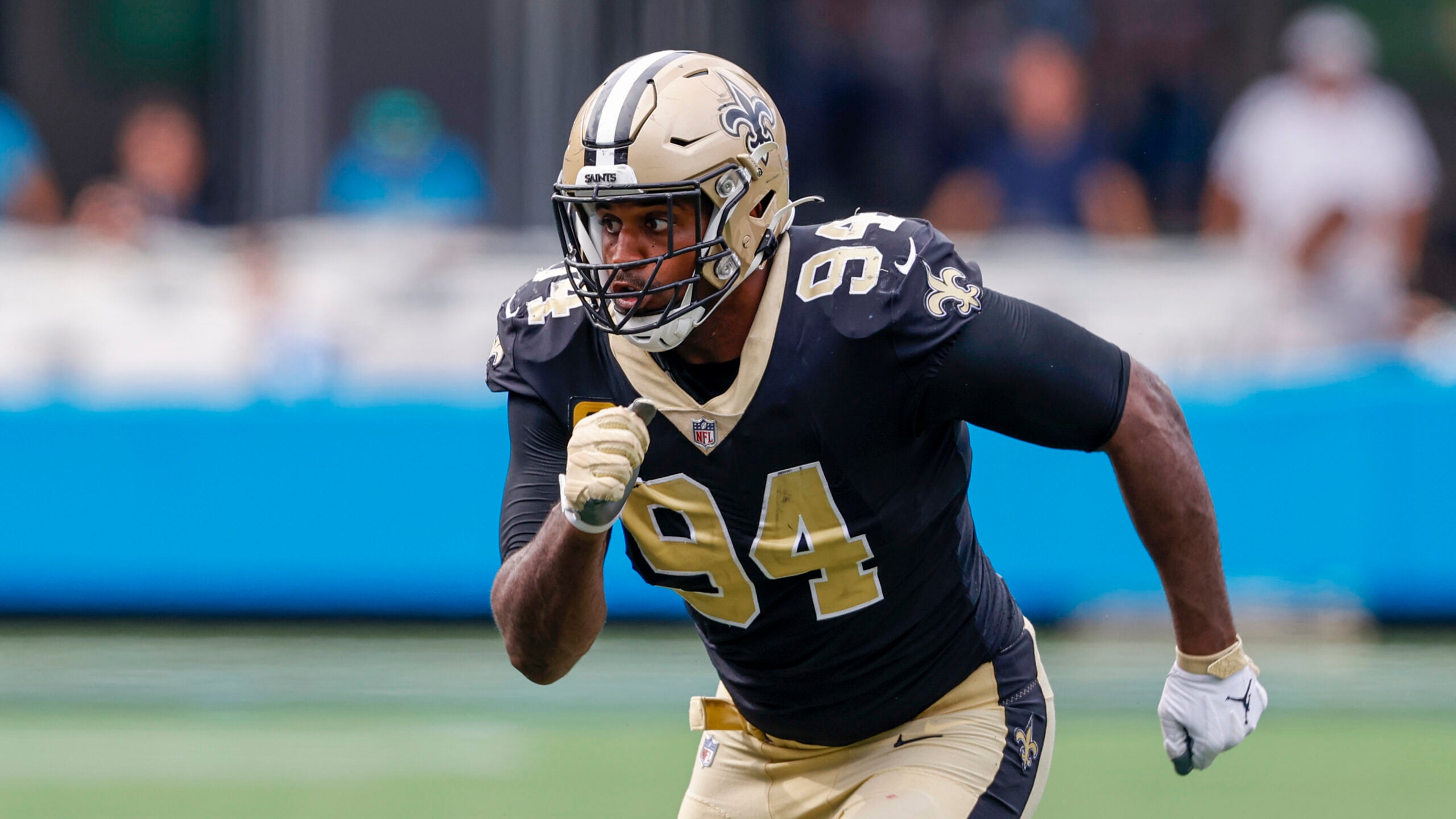 New Orleans Saints defensive end Cameron Jordan (94) signals