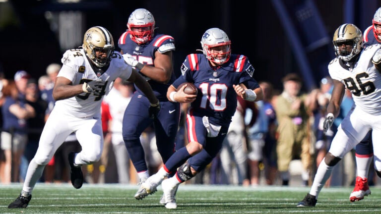 Sunday, September 26, 2021: New England Patriots quarterback Mac Jones (10)  warms up before the NFL football game between the New Orleans Saints and  the New England Patriots at Gillette Stadium, in