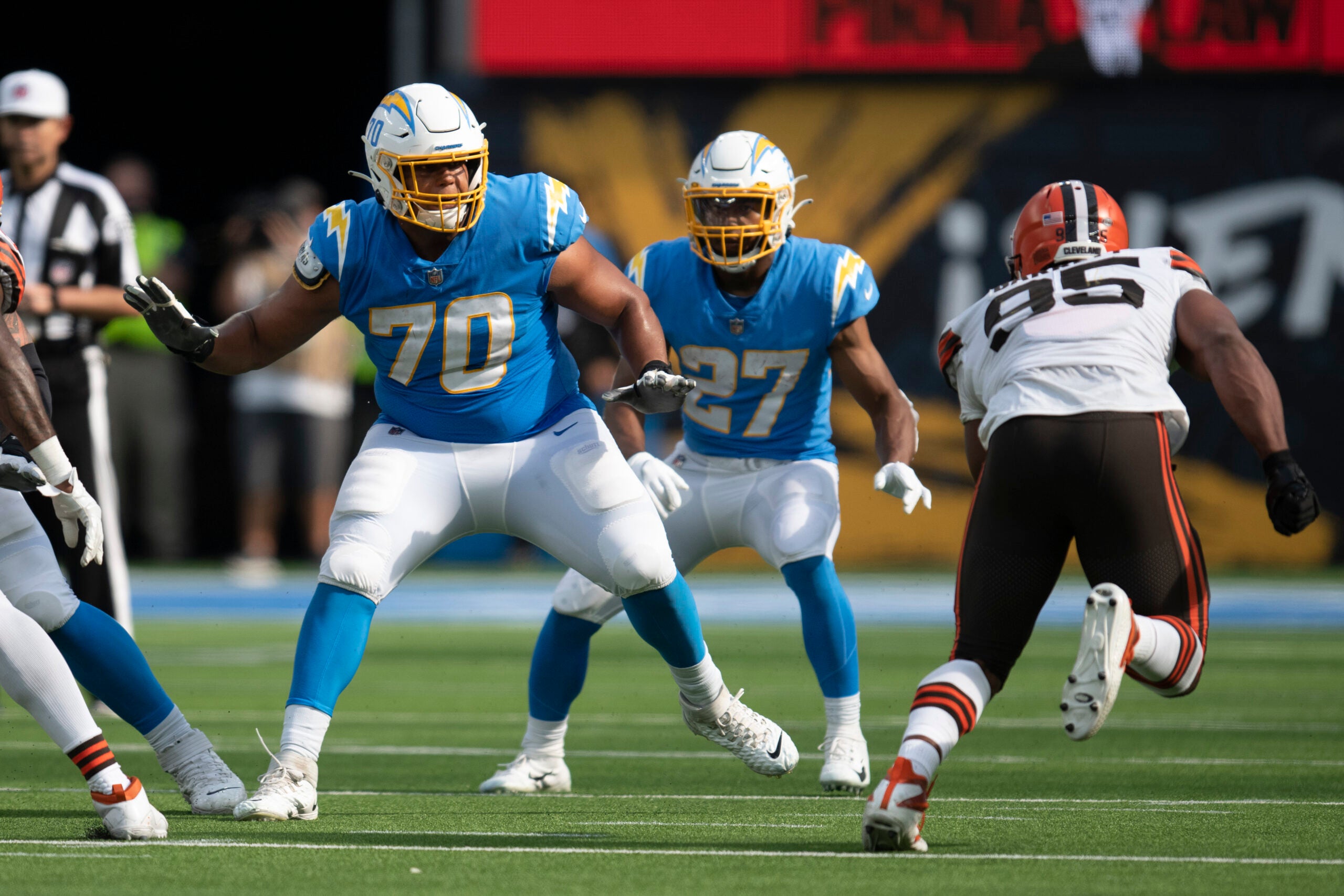 Tackle (70) Rashawn Slater of the Los Angeles Chargers blocks