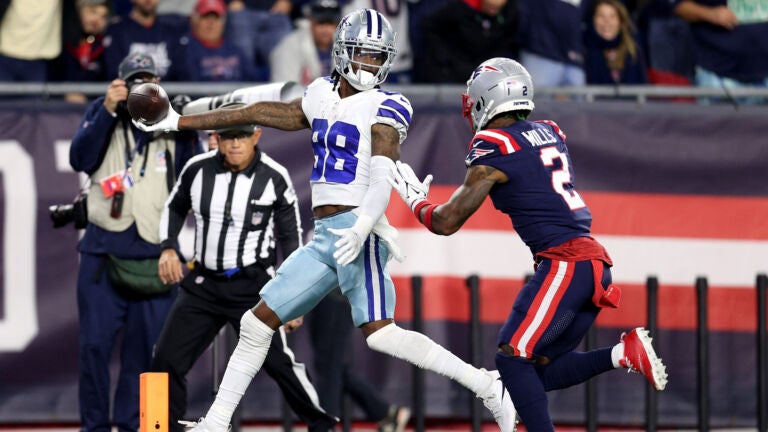 CeeDee Lamb of the Dallas Cowboys pulls in a touchdown pass against News  Photo - Getty Images