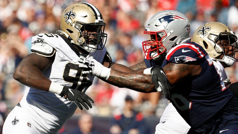 Patriots place OLs Isaiah Wynn, Michael Onwenu on COVID list