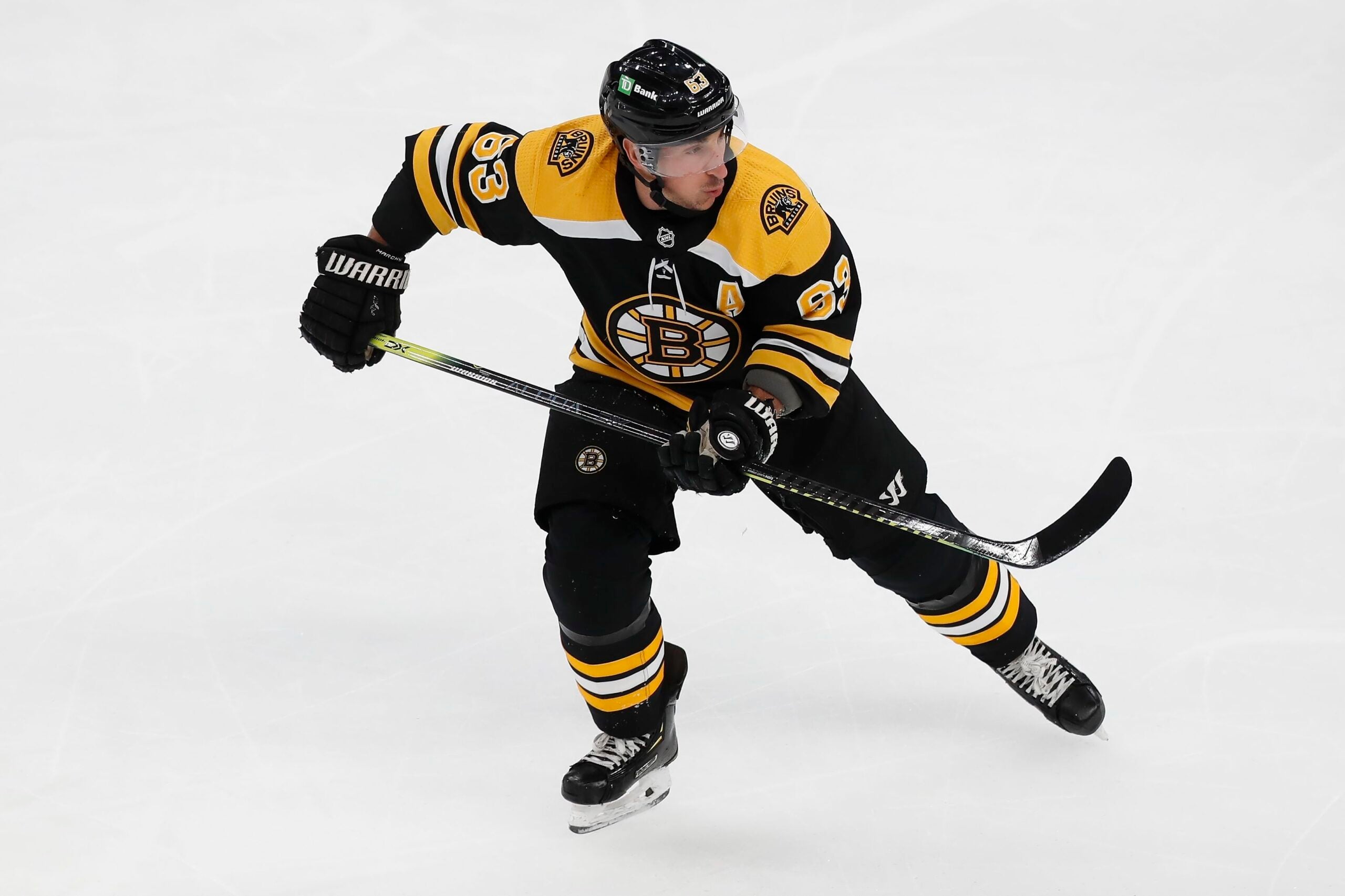 NHL referee takes out Bruins' Brad Marchand with surprise check in bizarre  moment