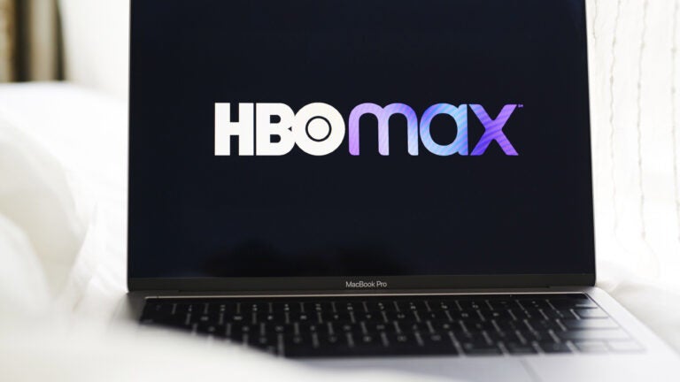 The logo for HBO Max on a laptop computer.