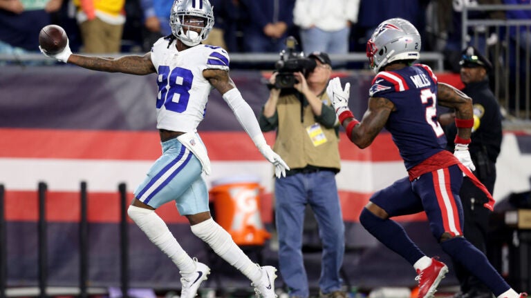 Cowboys pull out OT victory, 35-29, over Patriots for 5th straight win