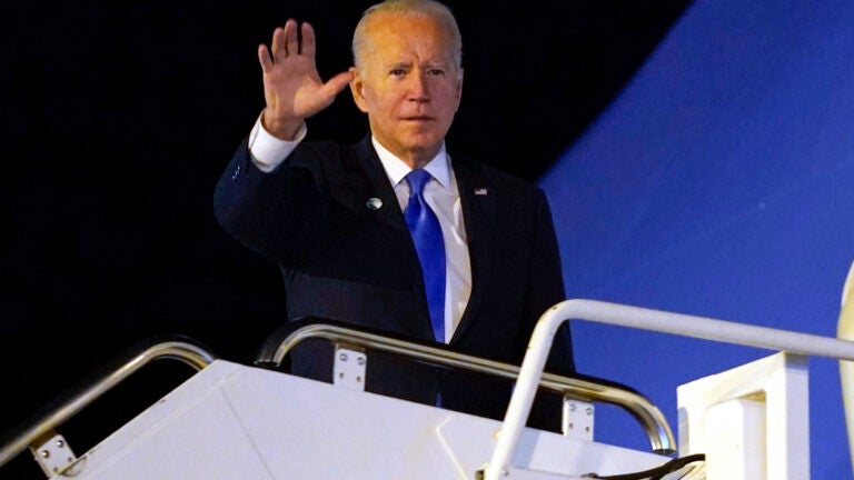 A toilet in the press conference with biden on Craiyon