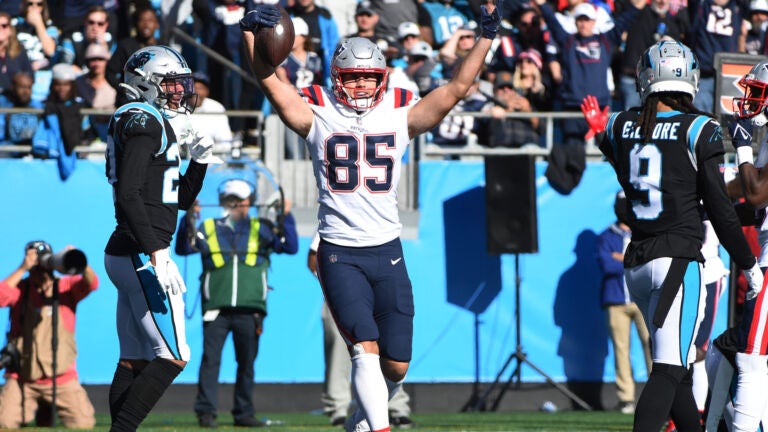 The New England Patriots defense signals that they recovered News Photo  - Getty Images