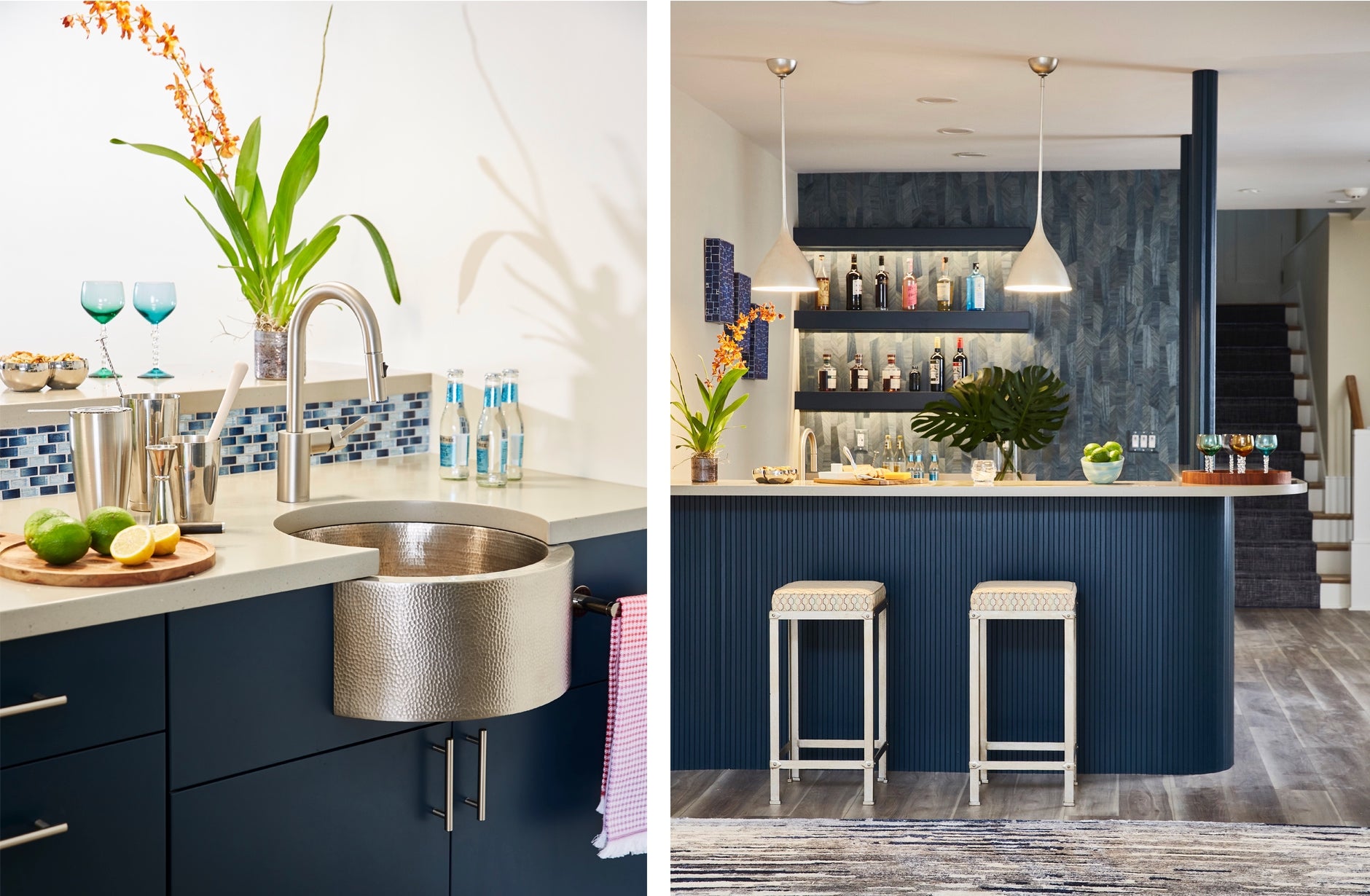 A detail shot of a home bar with a rounded farmer's sink that just out from the counter. There is a cutting board with limes and lemons on the counter. At the top of the counter sit two blue wine glasses. The back of the bar is lined with blue-and-white tile. The paired photo is of the room itself and shows two stools, a navy blue bar, and a navy blue back wall with open shelving holding liquor bottles.