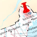Red Thumbtack Over Maine State USA Map. 3D rendering