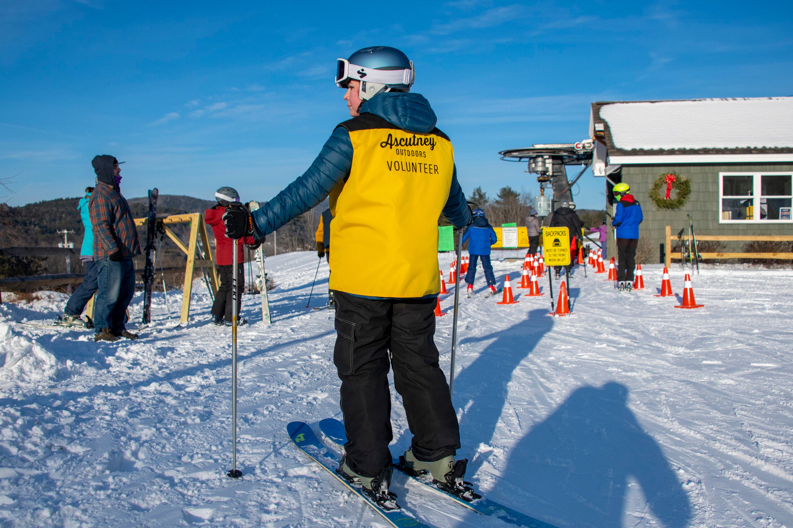 A volunteer with Ascutney Outdoors, a nonprofit with over 100 volunteers that now runs recreation on the mountain, in Brownsville, Vt., in January 2022. 