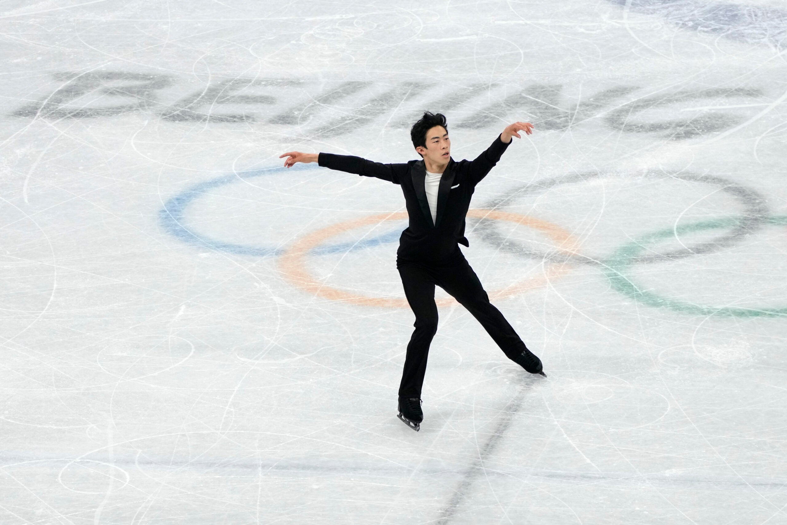 Vincent Zhou nathan chen covid figure skating olympics