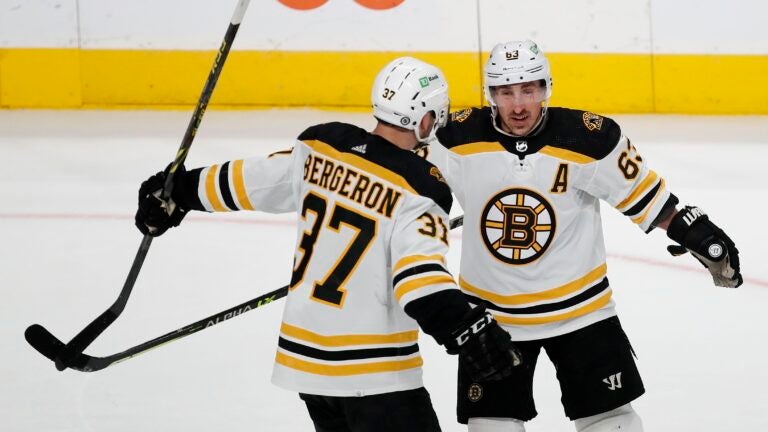 WATCH: Bruins' Brad Marchand and Patrice Bergeron bust out a