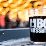 Mass Brewers Guild tasting glass under lights at the Power Beer Fest in 2018