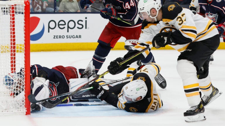 Marchand Bloodied, Scores Twice In Bruins' 7-3 Win Over Caps