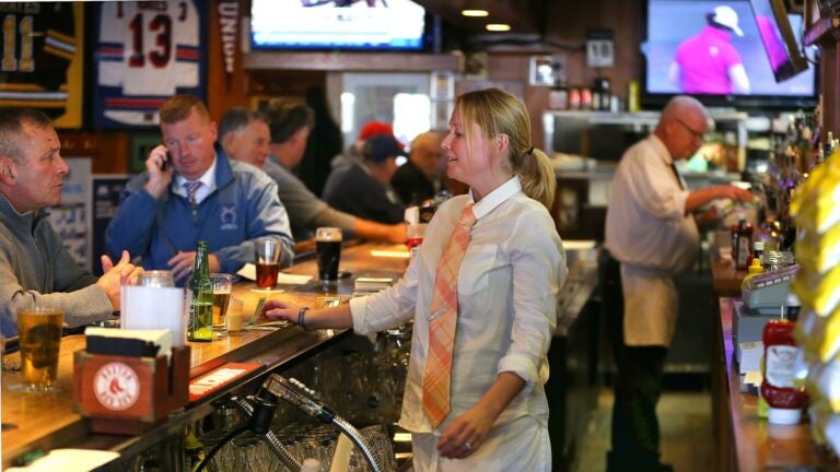 Nicole Eaton is the first female bartender at the quintessential working man's bar, The Eire Pub.