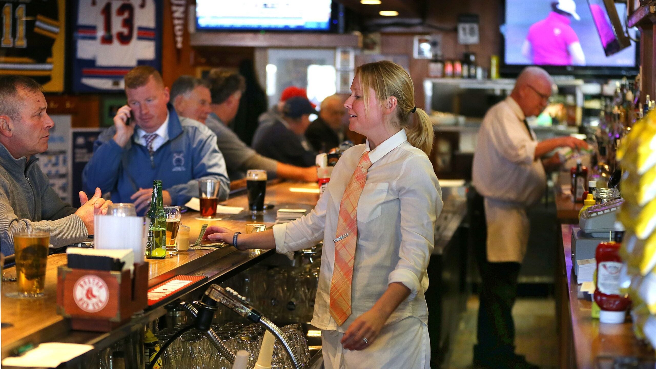 Nicole Eaton is the first female bartender at the quintessential working man's bar, The Eire Pub.