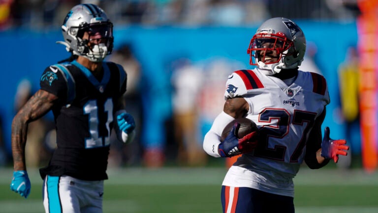 New England Patriots cornerback J.C. Jackson (27) celebrates his  interception with New England …