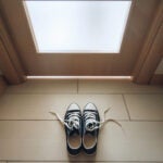 Sneakers with loosened laces. Take off your shoes. Etiquette