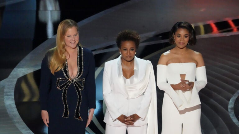 Hosts Amy Schumer, from left, Wanda Sykes, and Regina Hall appear on stage during the 94th Academy Awards at the Dolby Theatre in Los Angeles, on Sunday, March 27, 2022. (Ruth Fremson/The New York Times)