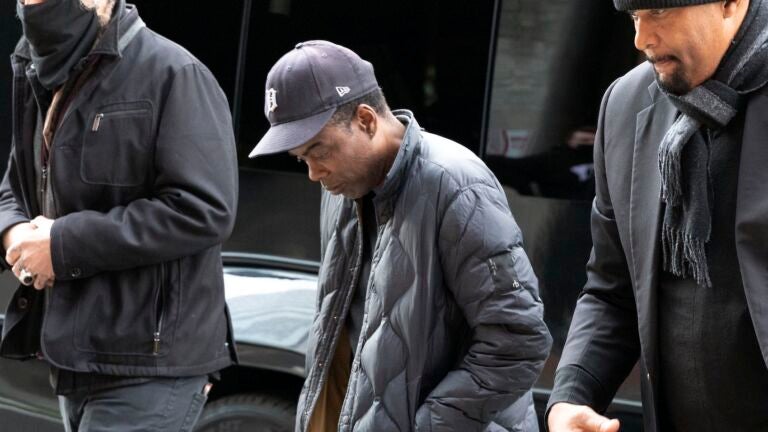 Chris Rock arrives at the Wilbur Theatre before performing in Boston Wednesday night.