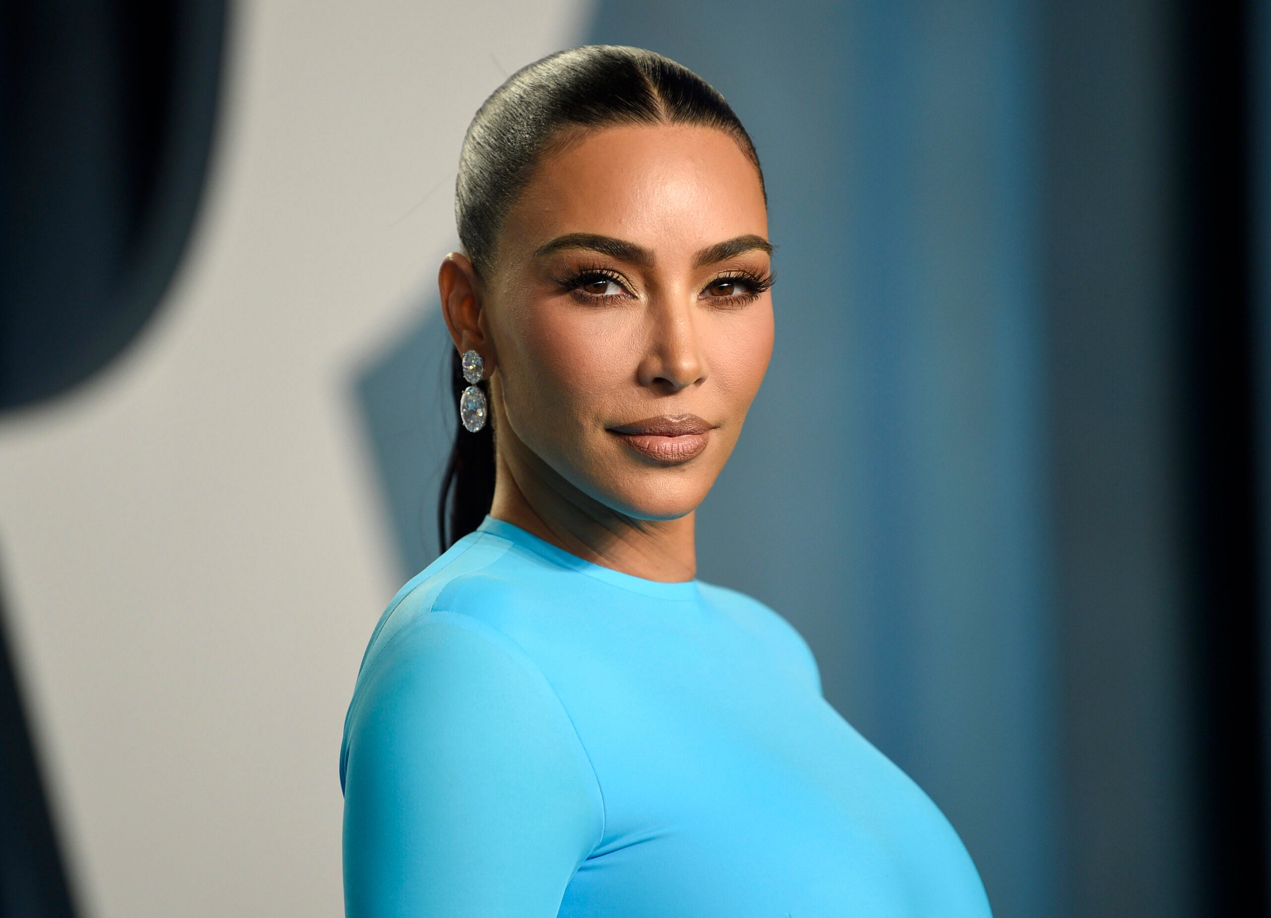 FILE - Kim Kardashian appears at the Vanity Fair Oscar Party in Beverly Hills, Calif., on March 27, 2022. Kim Kardashian testified Tuesday, April 26, 2022, that she had no memory of making any attempt to kill the reality show that starred her brother Rob Kardashian and his fiancée Blac Chyna. (Photo by Evan Agostini/Invision/AP, File)