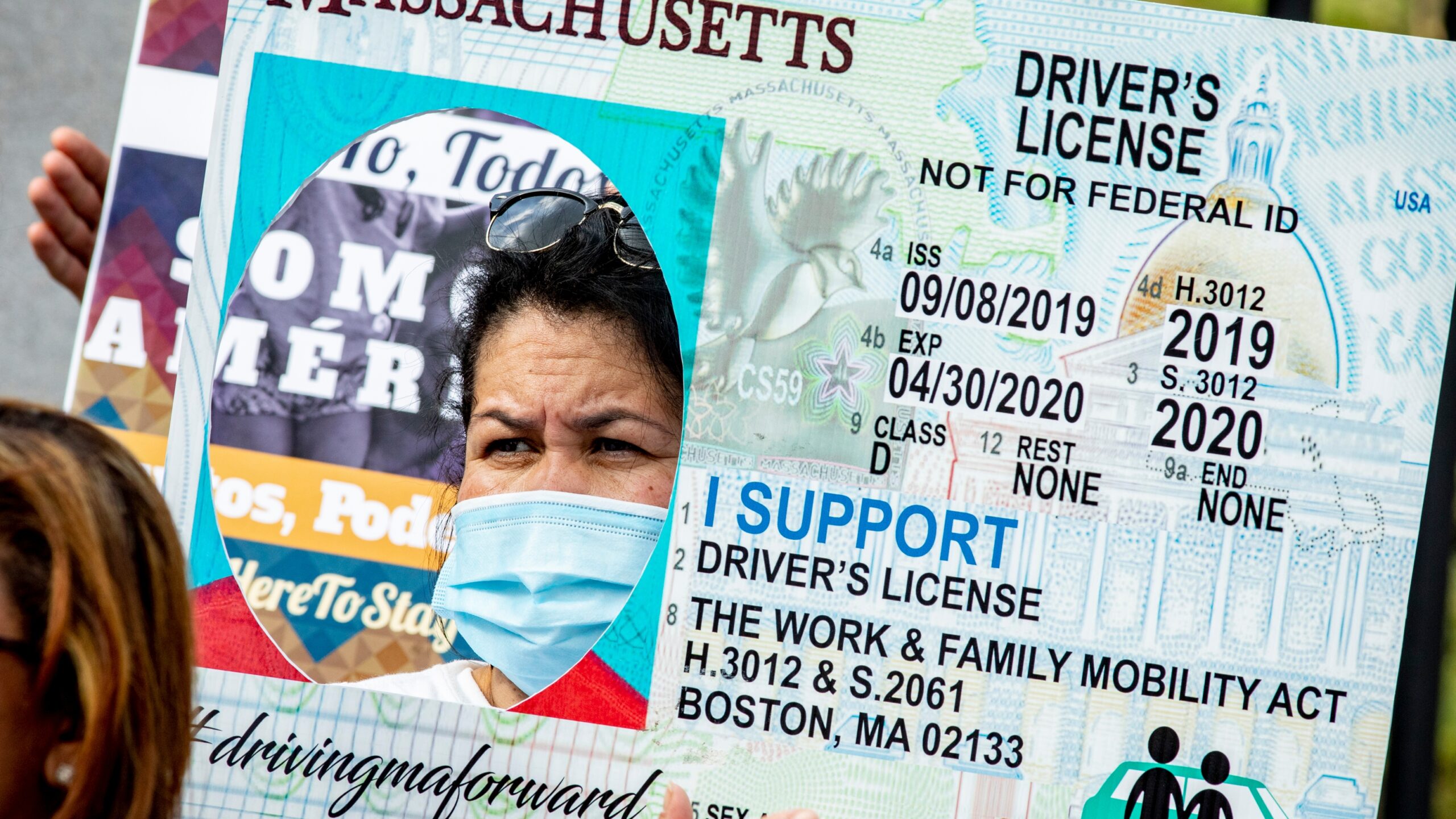 Massachusetts voters keep law allowing driver's license for undocumented  immigrants - Axios Boston