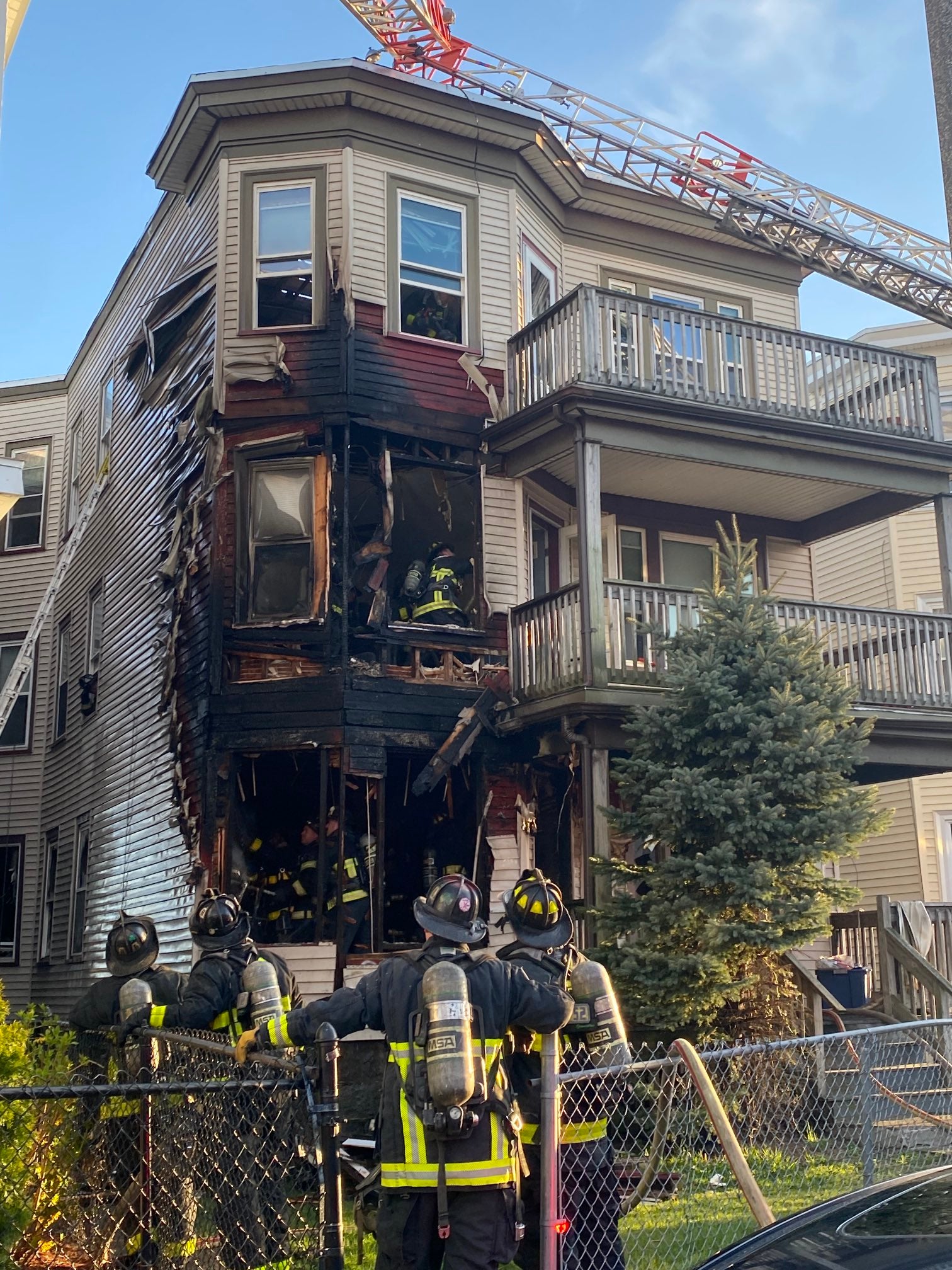 Fire in Dorchester triple-decker kills 2 dogs, displaces 8 people