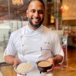 Fairmont Copley Plaza executive chef Zaid Khan poses with carbs ahead of the Boston Marathon