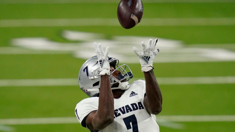 New England Patriots wide receiver DeVante Parker (1) runs a route during  the first half of an NFL football game against the Chicago Bears, Monday,  Oct. 24, 2022, in Foxborough, Mass. (AP