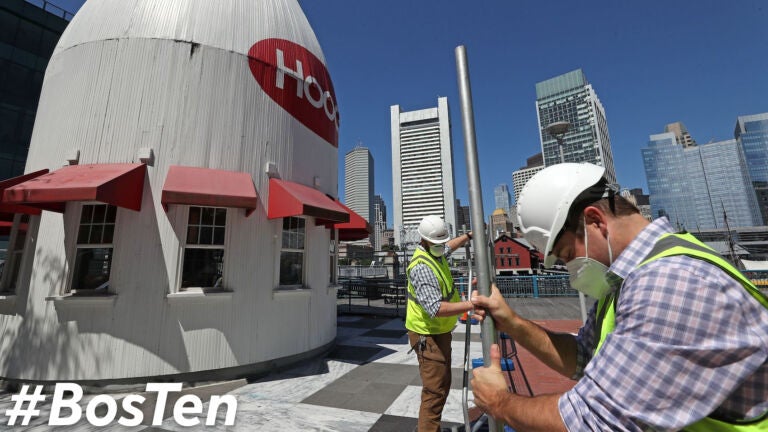 The giant HOOD milk bottle outside of Boston Children's Museum will get a facelift gets fenced off by construction crew.