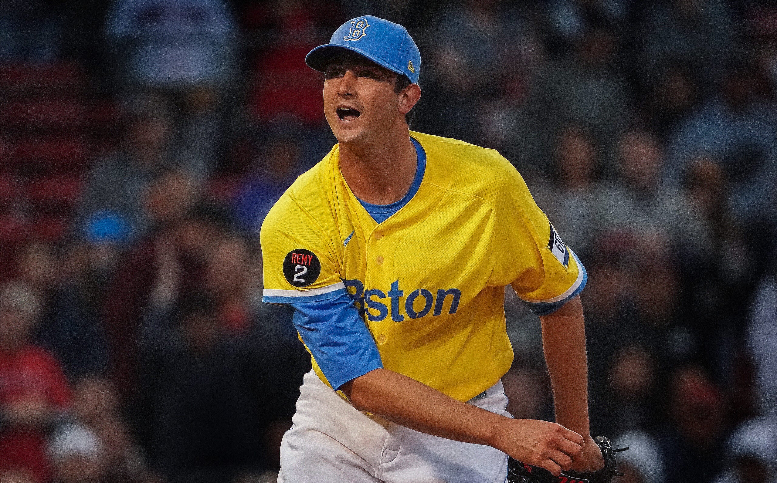 Garrett Whitlock in Red Sox yellow and blue uniform