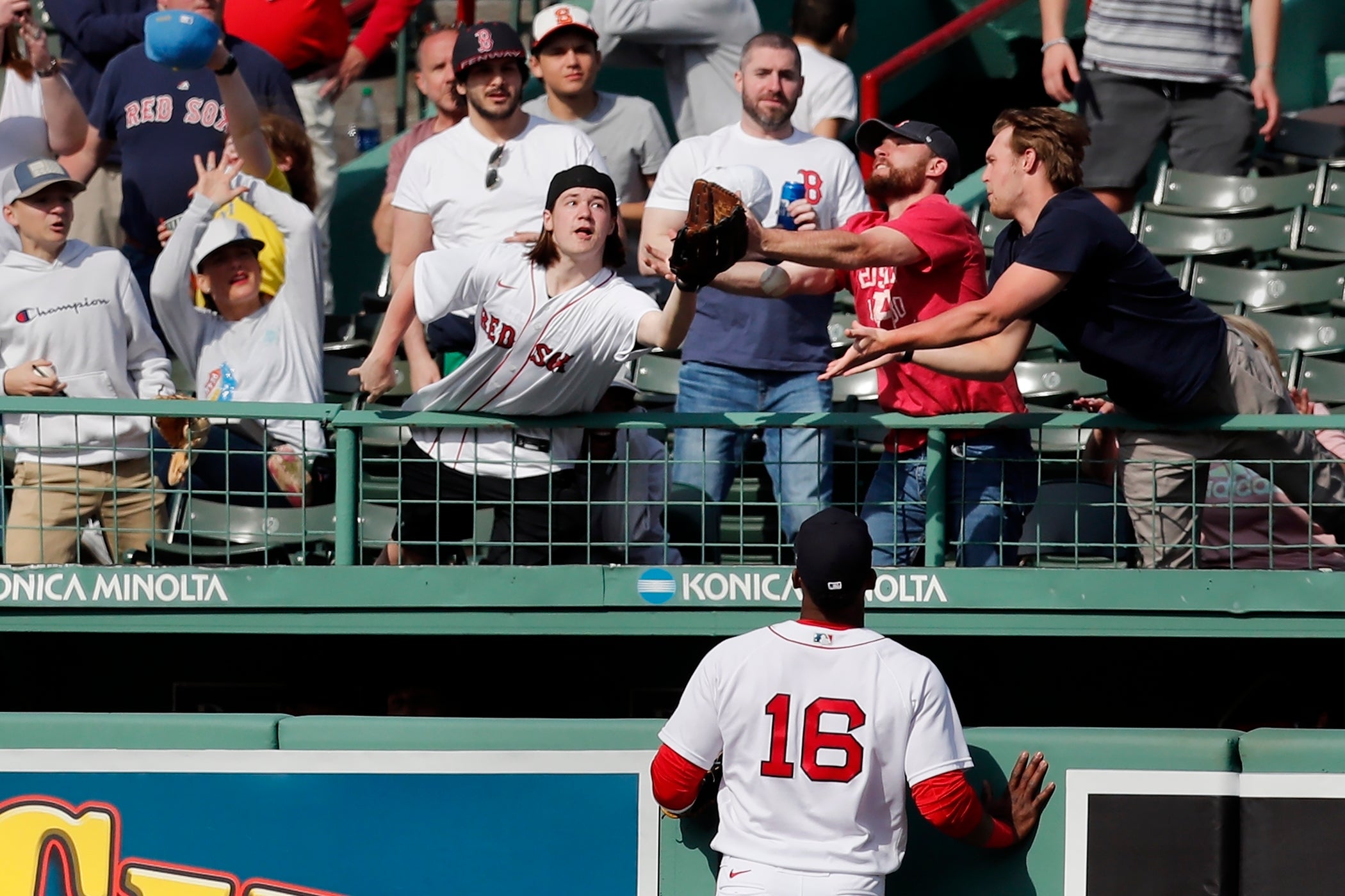 Franchy Cordero of the Red Sox watches a home run soar over the bullpen.