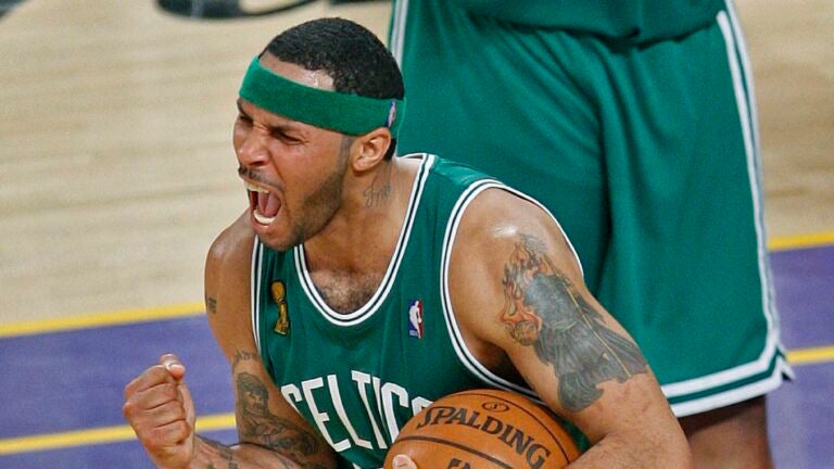 Boston Celtics guard Eddie House and his son came out on court to