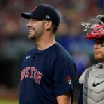 Red Sox pitcher Rich Hill smiling.