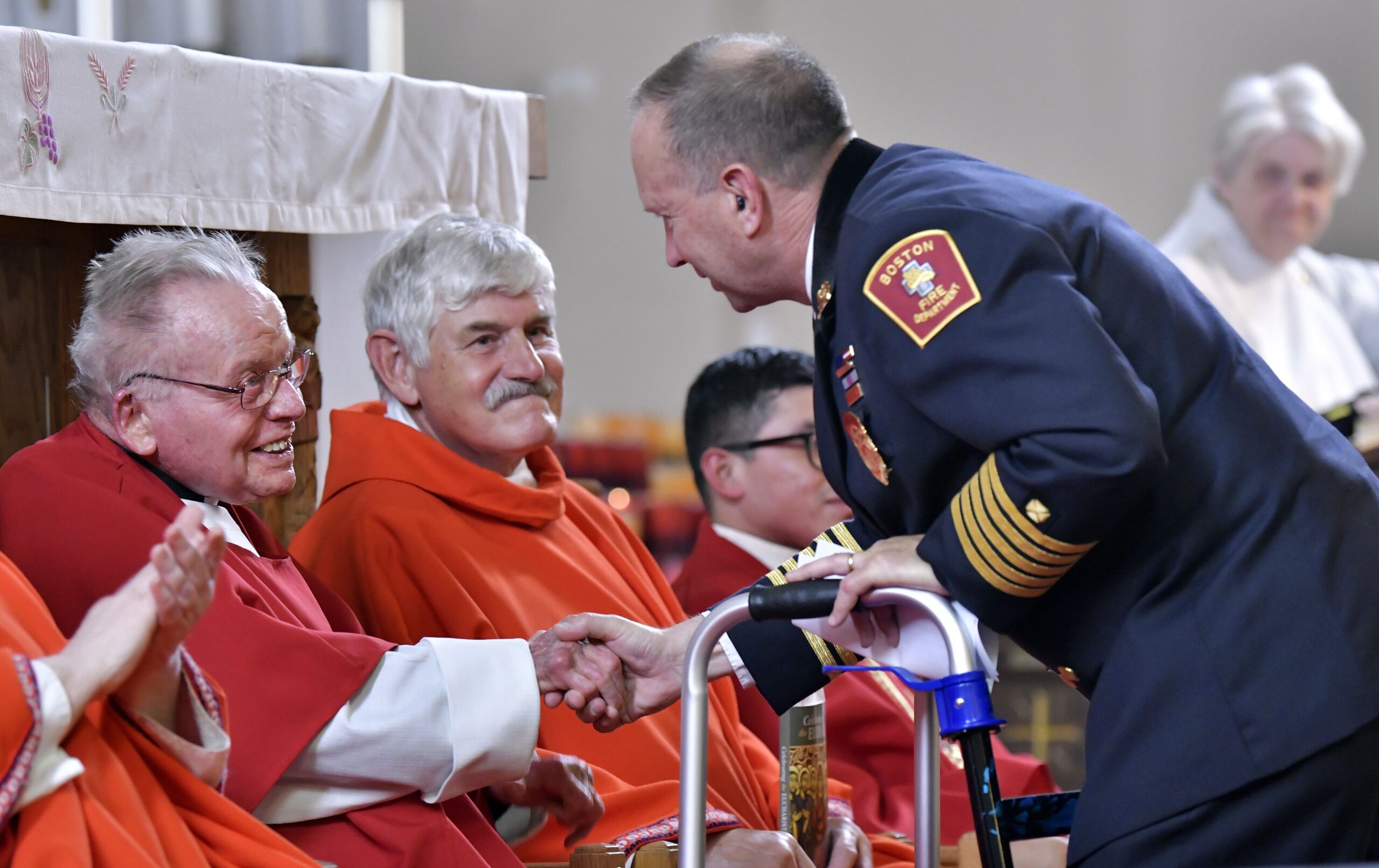 Boston fire department chaplain retires after 60 years, honored by community