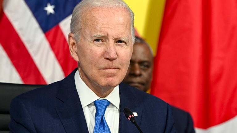 A toilet in the press conference with biden on Craiyon