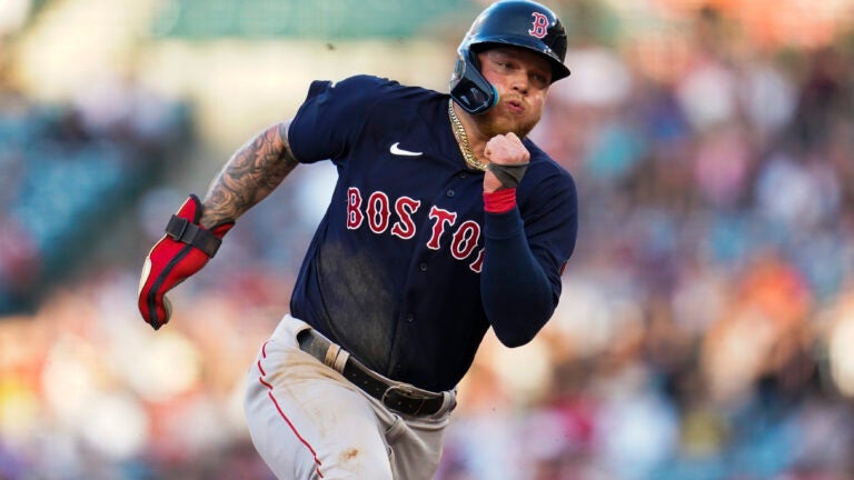 Boston Red Sox catcher Christian Vasquez is thrown out trying to